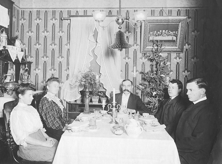 A Kansas City family celebrates with a Christmas tree in 1900.