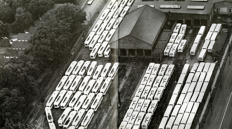 Decommissioned street cars and new city buses housed at 48th and Troost, 1957. THE KANSAS CITY STAR