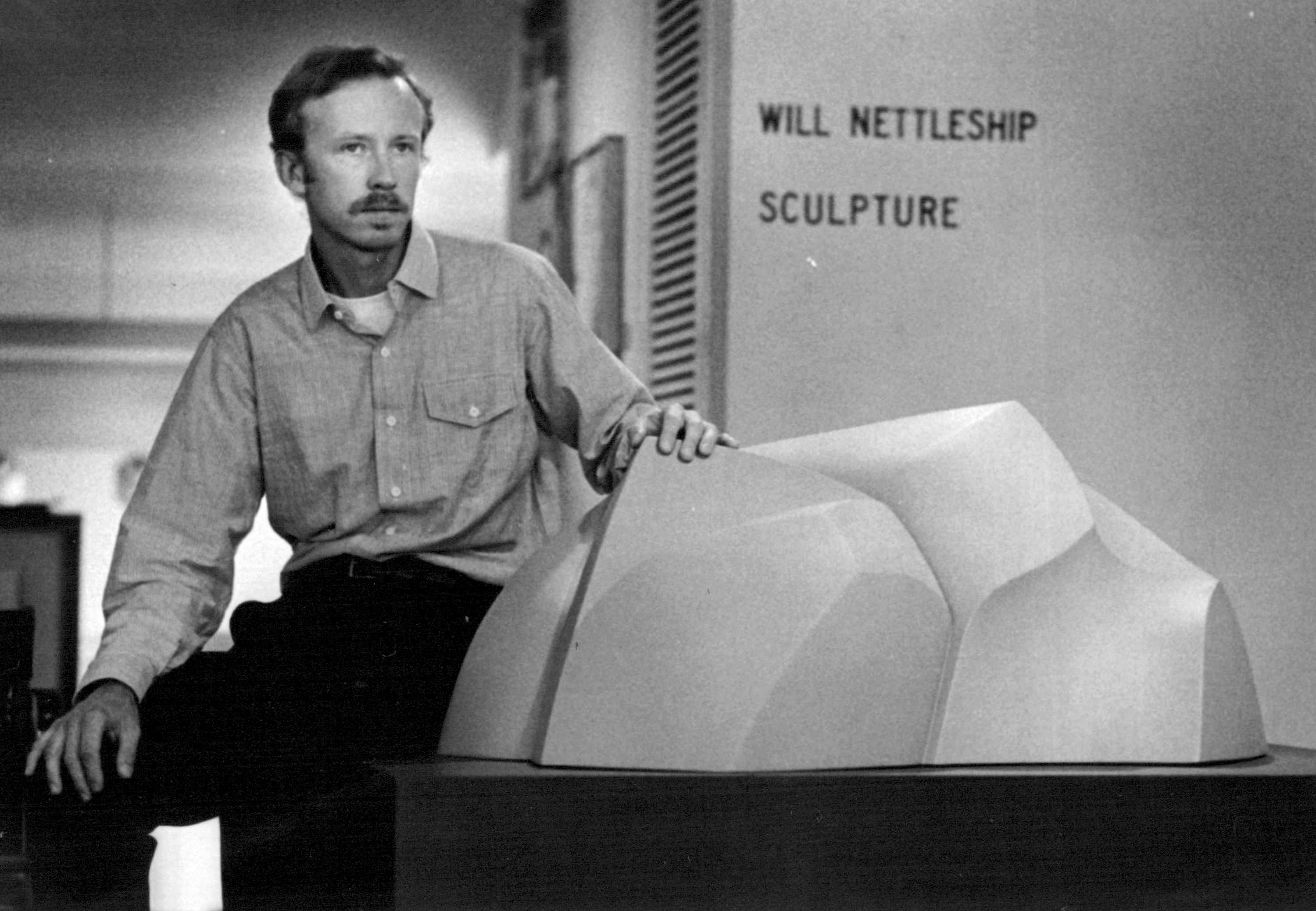 Will Nettleship with a cast concrete landscape sculpture in 1979. THE KANSAS CITY STAR