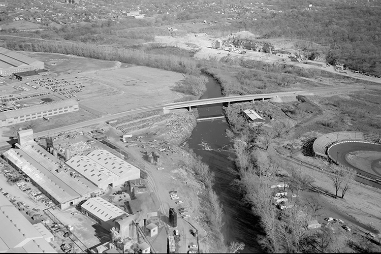 Aerial view of the Blue River near 12th Street and the surrounding Blue Valley Industrial District, 1962.