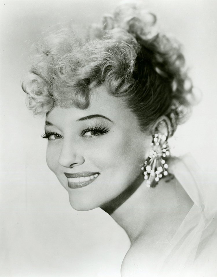 Before becoming the legendary “fan dancer,” Kansas City native Sally Rand began her career as a chorus girl while attending Central High School. In 1976, she returned at age 72 to serve as auctioneer in “Strip the Folly,” a benefit for the theater’s restoration. The Folly Theater Collection includes one of her autographed fans.