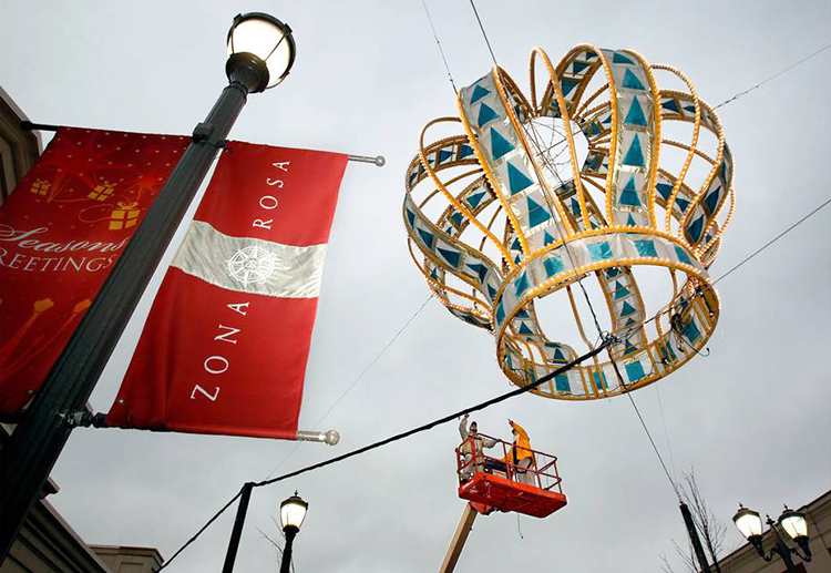 Installation of the Zona Rosa crowns. THE KANSAS CITY STAR