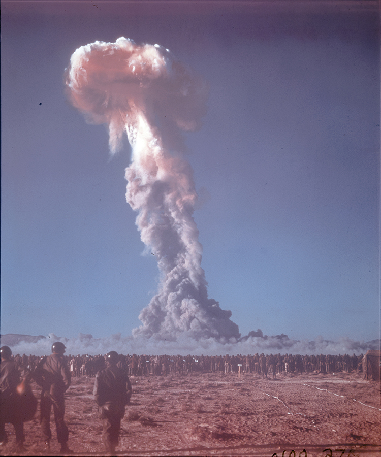 Military personnel observing an atomic explosion at the Nevada Test Site north of Las Vegas. SPECIAL COLLECTIONS AND ARCHIVES; UNIVERSITY LIBRARIES; UNIVERSITY OF NEVADA, LAS VEGAS