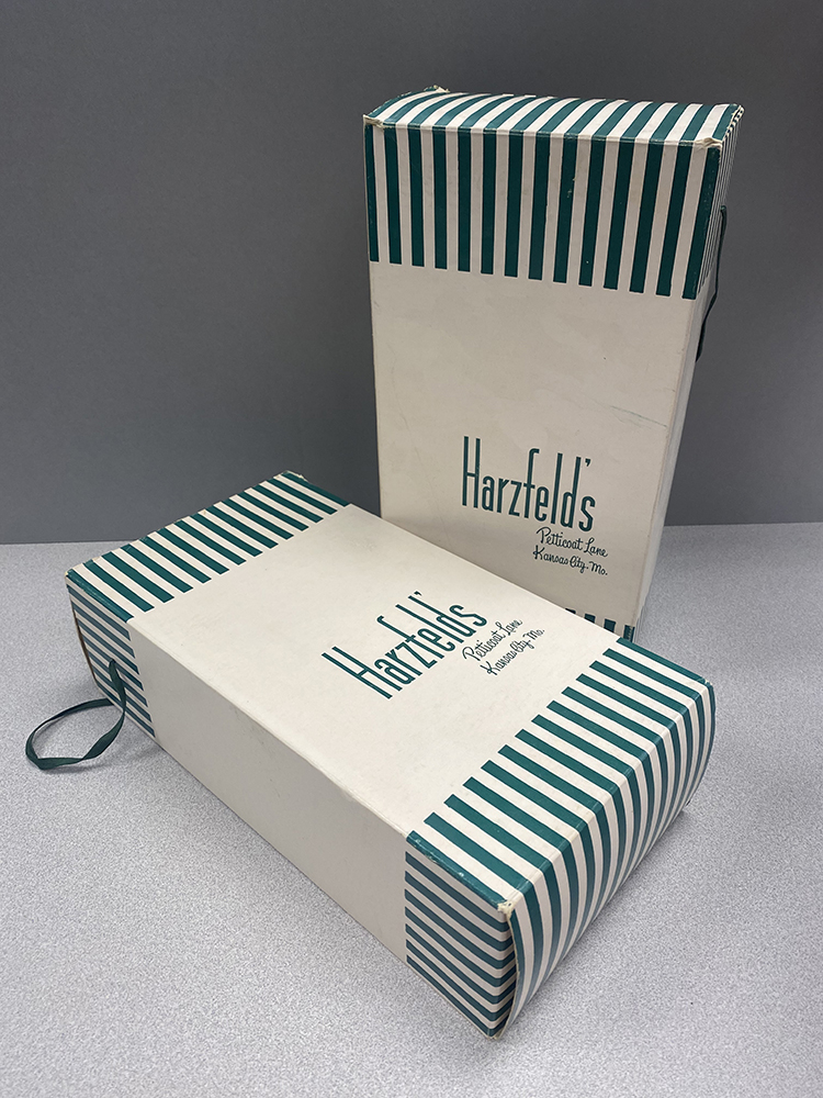 Harzfeld's boxes with their Petticoat Lane branding.