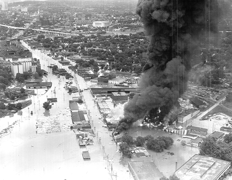 Flood and fire as seen looking northeast along Southwest Boulevard. Union Station is visible in the top center of the image.