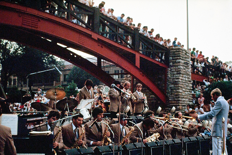 A jazz big band playing beneath a Brush Creek bridge.