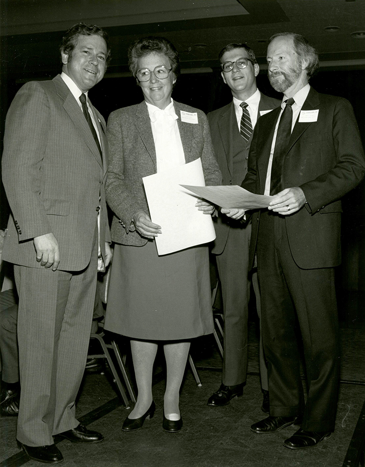 Mayor Richard Berkley presents Joan Dillon, Robert Dustman (Folly Theater Executive Director,) and Bob Berkebile (Principal Architect) with a Municipal Arts Commission Design Award in 1981.