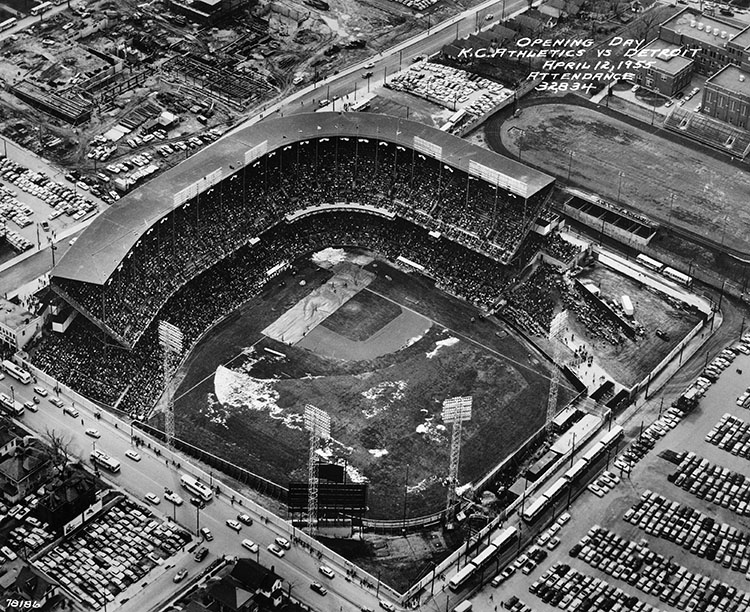 Municipal Stadium with cars parked anywere they could fit.