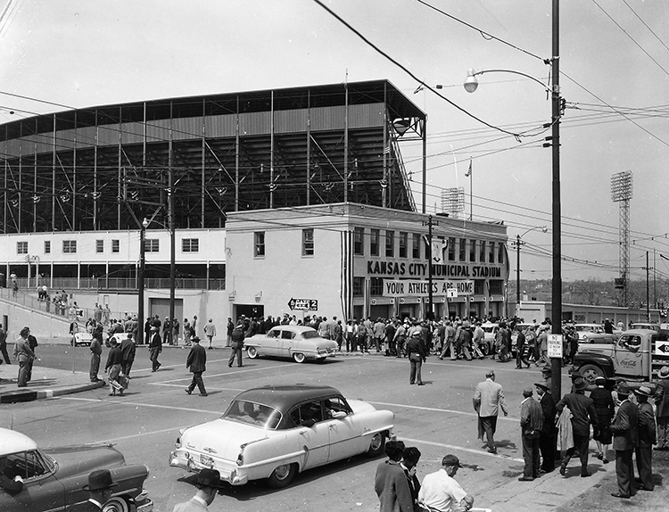 A crowd gathering for an Athletics game at Municipal Stadium.