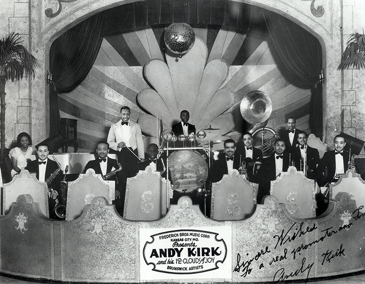 Andy Kirk and his Twelve Clouds of Joy in 1934. Jazz pianist and composer Mary Lou Williams can be seen on the far left. LABUDDE SPECIAL COLLECTIONS, UMKC LIBRARIES