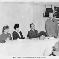Men and Women at Banquet Head Table