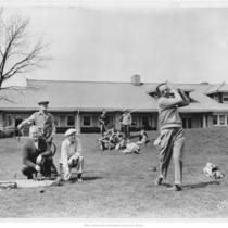Golfers and Clubhouse