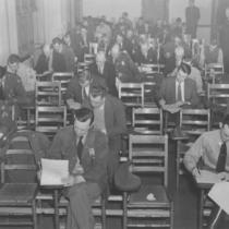 Men Taking an Exam