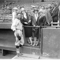 Baseball Player Posing with Spectators
