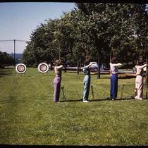 Four Women Practicing Archery on The Paseo