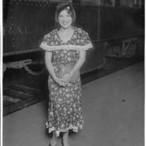 Woman Standing Next to Train Car