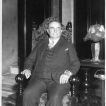 Man Seated in Chair