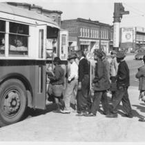 Children Boarding a Bus